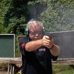 Bob Campbell shooting a pistol loaded with lead bullets