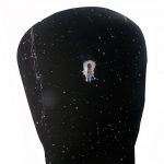 Single bullet hole in the center of a silhouette target's head