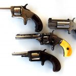 Four small revolvers