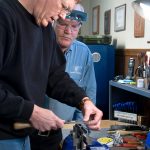 filing the top of the frame of a 1911 pistol