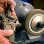 Buffing the frame and grip of a 1911 pistol