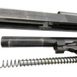close up of the slide barrel and the main spring of the Beretta 92S pistol showing little wear