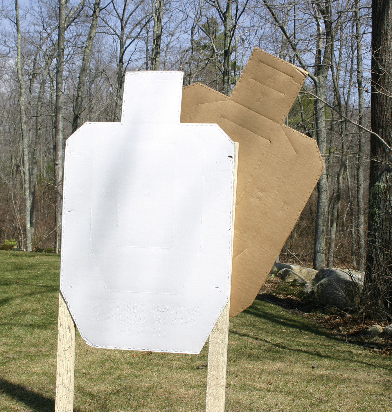 Cardboard target partially obscured to represent a hostage