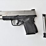 Springfield XD-S 4.0 left profile with spare magazine