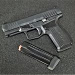 Arex Rex Delta left profile with 15-round magazine next to an extended 17-round magazine