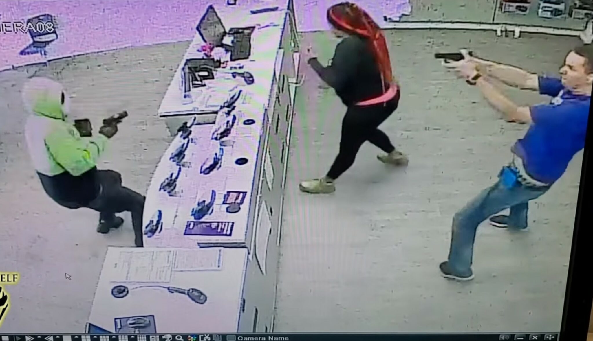 Employee with gun shooting at an armed robber over the counter